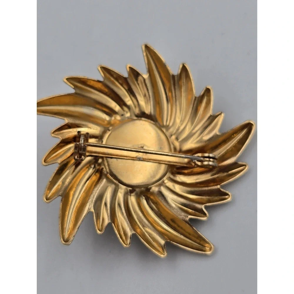 Vintage Gold Tone Swirl Sunburst Brooch Pin with Black Cabochon Center 1980s 90s